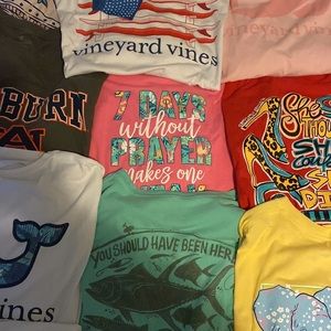 Tons of tshirts for sale as well as scrub tops .